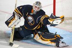 BUFFALO, NY - MARCH 30:  Jhonas Enroth #1 of the Buffalo Sabres makes a glove save against the New York Rangers at HSBC Arena on March 30, 2011 in Buffalo, New York.  (Photo by Rick Stewart/Getty Images)