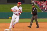 ST. LOUIS, MO - MARCH 31: Matt Holliday #7 of the St. Louis Cardinals rounds third base against the San Diego Padres on opening day at Busch Stadium on March 31, 2011 in St. Louis, Missouri.  (Photo by Dilip Vishwanat/Getty Images)