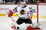 MONTREAL, CANADA - APRIL 5:  The puck goes wide past Corey Crawford #50 of the Chicago Blackhawks during the NHL game against the Montreal Canadiens at the Bell Centre on April 5, 2011 in Montreal, Quebec, Canada.  (Photo by Richard Wolowicz/Getty Images)