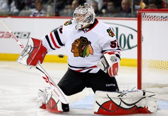 MONTREAL, CANADA - APRIL 5:  The puck goes wide past Corey Crawford #50 of the Chicago Blackhawks during the NHL game against the Montreal Canadiens at the Bell Centre on April 5, 2011 in Montreal, Quebec, Canada.  (Photo by Richard Wolowicz/Getty Images)