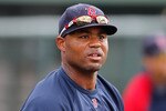 SARASOTA, FL - MARCH 05:  Outfielder Carl Crawford #13 of the Boston Red Sox warms up just before the start of the Grapefruit League Spring Training Game against the Baltimore Orioles at Ed Smith Stadium on March 5, 2011 in Sarasota, Florida.  (Photo by J. Meric/Getty Images)