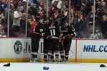 ANAHEIM, CA - APRIL 06:  (L-R) Ryan Getzlaf #15, Corey Perry #10, Saku Koivu #11 and Teemu Selanne #8 of the Anaheim Ducks celebrate Perry's third goal of the game and 50th of the year in the second period against the San Jose Sharks at Honda Center on April 6, 2011 in Anaheim, California.  (Photo by Jeff Gross/Getty Images)