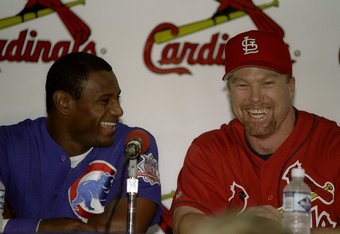 7 Sep 1998: Sammy Sosa #21 of the Chicago Cubs laughs with Mark McGwire #25 of the St Louis Cardinals during a press conference after the game against the Chicago Cubs at Busch Stadium in St Louis, Missouri. The Cardinals defeated the Cubs 3-2