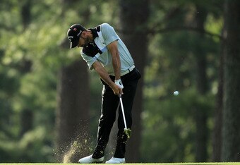 AUGUSTA, GA - APRIL 07:  Alvaro Quiros of Spain hits his approach shot on the 14th hole during the first round of the 2011 Masters Tournament at Augusta National Golf Club on April 7, 2011 in Augusta, Georgia.  (Photo by David Cannon/Getty Images)