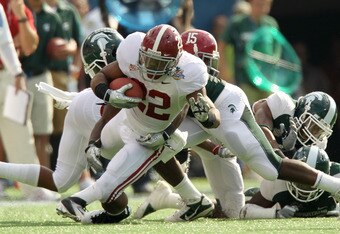 ORLANDO, FL - JANUARY 01:  Mark Ingram #22 of the Alabama Crimson Tide rushes during the Capitol One Bowl against the Michigan State Spartans at the Florida Citrus Bowl on January 1, 2011 in Orlando, Florida.  (Photo by Mike Ehrmann/Getty Images)