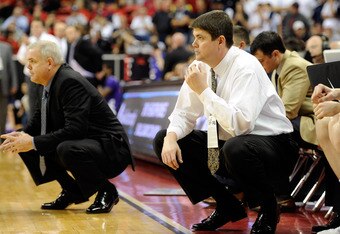 LAS VEGAS, NV - MARCH 10:  Head coach Dave Rose (L) and associate head coach Dave Rice of the Brigham Young University Cougars look on during the team's 64-58 victory over the Texas Christian University Horned Frogs in a quarterfinal game of the Conoco Mountain West Conference Basketball tournament at the Thomas & Mack Center March 10, 2011 in Las Vegas, Nevada.  (Photo by Ethan Miller/Getty Images)