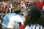 HOUSTON - DECEMBER 10:  Quarterback Vince Young #10 of the Tennessee Titans celebrates with defensive back Pacman Jones #32 after Young ran for the winning touchdown in overtime against the Houston Texans on December 10, 2006 at Reliant Stadium in Houston, Texas.  The Titans won 26-20 in overtime.  (Photo by Stephen Dunn/Getty Images)