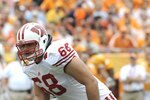 TAMPA, FL -  JANUARY 1: Lineman Gabe Carimi #68 of the Wisconsin Badgers sets to block  against the Tennessee Volunteers in the 2008 Outback Bowl at Raymond James Stadium on January 1, 2008 in Tampa, Florida.  The Volunteers won 21 - 17. (Photo by Al Messerschmidt/Getty Images)