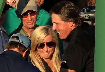 AUGUSTA, GA - APRIL 11:  Phil Mickelson celebrates with his wife Amy and family after his three-stroke victory after winning the 2010 Masters Tournament at Augusta National Golf Club on April 11, 2010 in Augusta, Georgia.  (Photo by David Cannon/Getty Images)