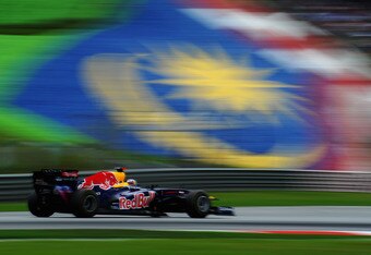 KUALA LUMPUR, MALAYSIA - APRIL 10:  Sebastian Vettel of Germany and Red Bull Racing drives during the Malaysian Formula One Grand Prix at the Sepang Circuit on April 10, 2011 in Kuala Lumpur, Malaysia.  (Photo by Clive Mason/Getty Images)