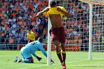 BLACKPOOL, ENGLAND - APRIL 10:  Abou Diaby of Arsenal celebrates after scoring the opening goal during the Barclays Premier League match between Blackpool and Arsenal at Bloomfield Road on April 10, 2011 in Blackpool, England.  (Photo by Chris Brunskill/Getty Images)