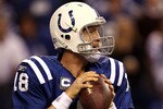 INDIANAPOLIS, IN - JANUARY 08:  Quarterback Peyton Manning #18 of the Indianapolis Colts looks to pass against the New York Jets during their 2011 AFC wild card playoff game at Lucas Oil Stadium on January 8, 2011 in Indianapolis, Indiana. The Jets won 17-16.  (Photo by Jonathan Daniel/Getty Images)