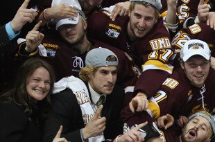 ST. PAUL, MN - APRIL 09:  :  :  The Minnesota Duluth Bulldogs celebrate with the trophy after they defeated the Michigan Wolverines after the championship game of the 2011 NCAA Men's Frozen Four on April 9, 2011 at the Xcel Energy Center in St. Paul, Minnesota. The Minnesota Duluth Bulldogs defeated the Michigan Wolverines 3-2 in overtime.  (Photo by Elsa/Getty Images)