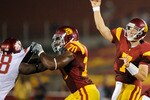 LOS ANGELES, CA - SEPTEMBER 26:   Quarterback Matt Barkley #7 of the USC Trojans throws a pass as Tyron Smith #70 blocks Jesse Feagin #98 of  the Washington State Cougars during the second quarter of the college football game at the Los Angeles Memorial Coliseum on September 26, 2009 in Los Angeles, California.  (Photo by Kevork Djansezian/Getty Images)