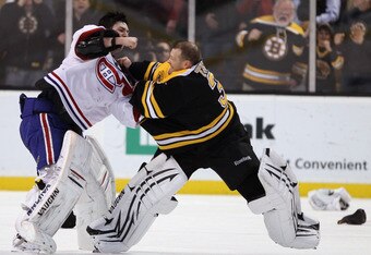 BOSTON, MA - FEBRUARY 09:  Tim Thomas #30 of the Boston Bruins and Carey Price #31 of the Montreal Canadiens fight in the second period on February 9, 2011 at the TD Garden in Boston, Massachusetts.  (Photo by Elsa/Getty Images)