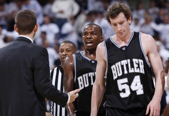 CINCINNATI, OH - DECEMBER 9: Shelvin Mack #1 and Matt Howard #54 of the Butler Bulldogs come off the floor during a timeout in the game against the Xavier Musketeers at Cintas Center on December 9, 2010 in Cincinnati, Ohio. Xavier defeated Butler 51-49. (Photo by Joe Robbins/Getty Images)