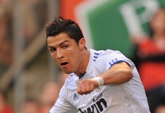 BILBAO, SPAIN - APRIL 09:  Cristiano Ronaldo of Real Madrid scores Real's third goal during the La Liga match between Athletic Bilbao and Real Madrid at San Mames Stadium on April 9, 2011 in Bilbao, Spain.  (Photo by Denis Doyle/Getty Images)