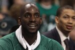 BOSTON, MA - MARCH 16:  Kevin Garnett #5 of the Boston Celtics encourages his teammates from the bench in the fourth quarter against the Indiana Pacers on March 16, 2011 at the TD Garden in Boston, Massachusetts. The Celtics defeated the Indiana Pacers 92-80. NOTE TO USER: User expressly acknowledges and agrees that, by downloading and/or using this Photograph, User is consenting to the terms and conditions of the Getty Images License Agreement.  (Photo by Elsa/Getty Images)