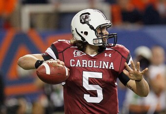 ATLANTA, GA - DECEMBER 04:  Stephen Garcia #5 of the South Carolina Gamecocks looks to pass against the Auburn Tigers during the 2010 SEC Championship at Georgia Dome on December 4, 2010 in Atlanta, Georgia.  (Photo by Kevin C. Cox/Getty Images)