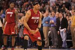 OKLAHOMA CITY, OK - JANUARY 30:  Guard Eddie House #55 of the Miami Heat celebrates after making a three-point shot during a 108-103 win against the Oklahoma City Thunder at Ford Center on January 30, 2011 in Oklahoma City, Oklahoma.  NOTE TO USER: User expressly acknowledges and agrees that, by downloading and or using this photograph, User is consenting to the terms and conditions of the Getty Images License Agreement.  (Photo by Ronald Martinez/Getty Images)