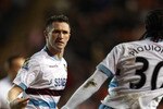 BLACKPOOL, ENGLAND - FEBRUARY 02:  Robbie Keane of West Ham United celebrates with Freddie Piquionne after scoring his goal during the Barclays Premier League match between Blackpool and West Ham United at Bloomfield Road on February 2, 2011 in Blackpool, England.  (Photo by Alex Livesey/Getty Images)