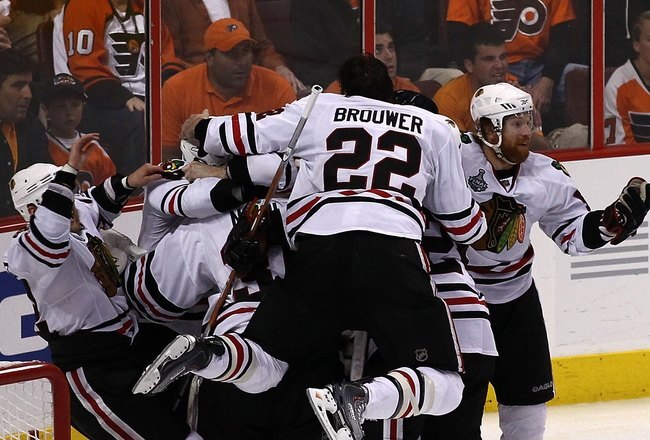 PHILADELPHIA - JUNE 09:  The Chicago Blackhawks celebrate after teammate Patrick Kane #88 scored the game-winning goal in overtime to defeat the Philadelphia Flyers 4-3 and win the Stanley Cup in Game Six of the 2010 NHL Stanley Cup Final at the Wachovia Center on June 9, 2010 in Philadelphia, Pennsylvania.  (Photo by Al Bello/Getty Images)