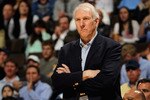 DENVER, CO - MARCH 23:  Head coach Gregg Popovich of the San Antonio Spurs looks on as he leads his team against the Denver Nuggets at the Pepsi Center on March 23, 2011 in Denver, Colorado. The Nuggets defeated the Spurs 115-112. NOTE TO USER: User expressly acknowledges and agrees that, by downloading and or using this photograph, User is consenting to the terms and conditions of the Getty Images License Agreement.  (Photo by Doug Pensinger/Getty Images)