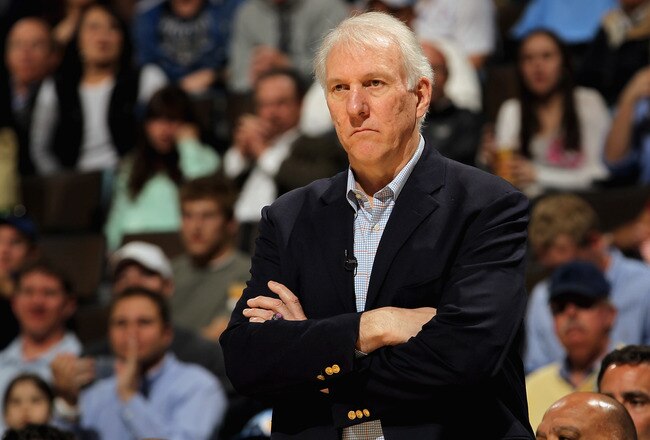 DENVER, CO - MARCH 23:  Head coach Gregg Popovich of the San Antonio Spurs looks on as he leads his team against the Denver Nuggets at the Pepsi Center on March 23, 2011 in Denver, Colorado. The Nuggets defeated the Spurs 115-112. NOTE TO USER: User expressly acknowledges and agrees that, by downloading and or using this photograph, User is consenting to the terms and conditions of the Getty Images License Agreement.  (Photo by Doug Pensinger/Getty Images)