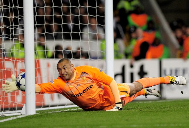 LONDON, ENGLAND - APRIL 13:  Goalkeeper Heurelho Gomes of Spurs can't stop Cristiano Ronaldo of Real Madrid scoring their first goal during the UEFA Champions League quarter final second leg match between Tottenham Hotspur and Real Madrid at White Hart Lane on April 13, 2011 in London, England.  (Photo by Shaun Botterill/Getty Images)