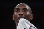 LOS ANGELES, CA - APRIL 10:  Kobe Bryant #24 of the Los Angeles Lakers puts his jersey in his mouth after committing a foul in the second half against the Oklahoma City Thunder at Staples Center on April 10, 2011 in Los Angeles, California. The Thunder defeated the Lakers 120-106. NOTE TO USER: User expressly acknowledges and agrees that, by downloading and or using this photograph, User is consenting to the terms and conditions of the Getty Images License Agreement.  (Photo by Jeff Gross/Getty Images)