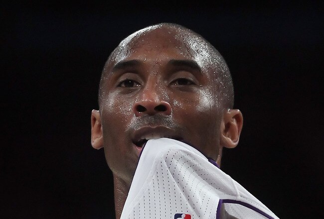 LOS ANGELES, CA - APRIL 10:  Kobe Bryant #24 of the Los Angeles Lakers puts his jersey in his mouth after committing a foul in the second half against the Oklahoma City Thunder at Staples Center on April 10, 2011 in Los Angeles, California. The Thunder defeated the Lakers 120-106. NOTE TO USER: User expressly acknowledges and agrees that, by downloading and or using this photograph, User is consenting to the terms and conditions of the Getty Images License Agreement.  (Photo by Jeff Gross/Getty Images)