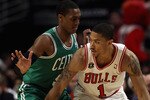 CHICAGO, IL - APRIL 07: Derrick Rose #1 of the Chicago Bulls moves against Rajon Rondo #9 of the Boston Celtics at United Center on April 7, 2011 in Chicago, Illinois. The Bulls defeated the Celtics 97-81. NOTE TO USER: User expressly acknowledges and agress that, by downloading and/or using this photograph, User is consenting to the terms and conditions of the Getty Images License Agreement.  (Photo by Jonathan Daniel/Getty Images)