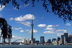 391776 02: (FILE PHOTO) The CN Tower and the Skydome highlight the Toronto skyline in his undated file photo. The International Olympic Committee (IOC) meets in Moscow July 13, 2001 to decide between front runners Beijing, Paris and Toronto for the site of the 2008 summer Olympics. (Photo by Carlo Allegri/Getty Images)