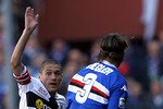 GENOA, ITALY - MARCH 20: Reto Ziegler of UC Sampdoria battles for the ball with Stefano Morrone of Parma FC during the Serie A match between UC Sampdoria v Parma FC at Stadio Luigi Ferraris on March 20, 2011 in Genoa, Italy.  (Photo by Gabriele Maltinti/Getty Images)