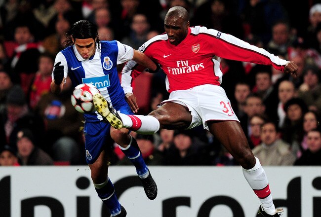 LONDON, ENGLAND - MARCH 09:  Falcao of Porto is tackled by Sol Campbell of Arsenal during the UEFA Champions League round of 16 match between Arsenal and FC Porto at the Emirates Stadium on March 9, 2010 in London, England.  (Photo by Mike Hewitt/Getty Images)
