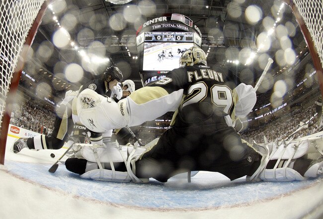 PITTSBURGH, PA - APRIL 13: Marc-Andre Fleury #29 of the Pittsburgh Penguins protects the net against the Tampa Bay Lightning in Game One of the Eastern Conference Quarterfinals during the 2011 NHL Stanley Cup Playoffs at Consol Energy Center on April 13, 2011 in Pittsburgh, Pennsylvania.  The Penguins defeated the Lightning 3-0.  (Photo by Justin K. Aller/Getty Images)