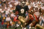15 Oct 1988:  Tony Rice of the Notre Dame Fighting Irish runs with the ball during a game against the Miami Hurricanes at Notre Dame Stadium in South Bend, Indiana.  Notre Dame won the game, 31-30. Mandatory Credit: Jonathan Daniel  /Allsport