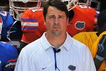 GAINESVILLE, FL - APRIL 9:  Coach Will Muschamp of the Florida Gators takes the field before the Orange and Blue spring football game April 9, 2010 Ben Hill Griffin Stadium in Gainesville, Florida.  (Photo by Al Messerschmidt/Getty Images)