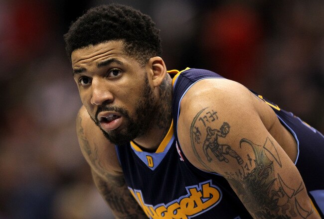 LOS ANGELES, CA - MARCH 5:   Wilson Chandler #21 of the Denver Nuggets waits in the game against the Los Angeles Clippers at Staples Center on March 5, 2011 in Los Angeles, California.  NOTE TO USER: User expressly acknowledges and agrees that, by downloading and or using this photograph, User is consenting to the terms and conditions of the Getty Images License Agreement. (Photo by Stephen Dunn/Getty Images)