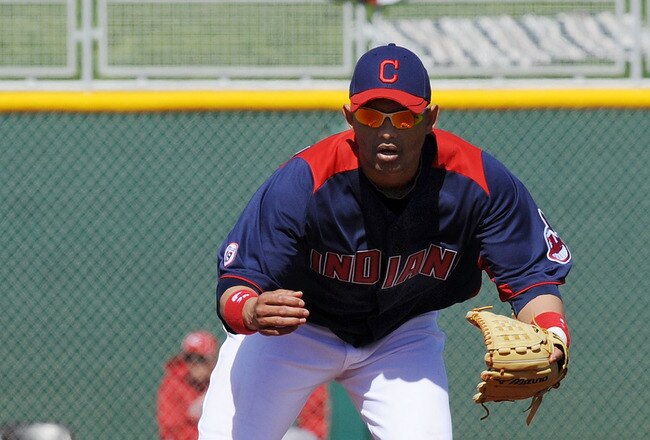 GOODYEAR, AZ - FEBRUARY 27:  Orlando Cabrera #20 of the Cleveland Indians gets ready to field a ground ball against the Cincinnati Reds at Goodyear Ballpark on February 27, 2011 in Goodyear, Arizona.  (Photo by Norm Hall/Getty Images)