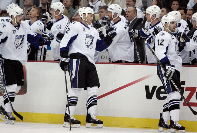 PITTSBURGH, PA - APRIL 15:  Eric Brewer#2 of the Tampa Bay Lightning celebrates his first period goal with his teammates during Game Two of the Eastern Conference Quarterfinals against the  Pittsburgh Penguins during the 2011 NHL Stanley Cup Playoffs at Consol Energy Center on April 15, 2011 in Pittsburgh, Pennsylvania.  (Photo by Justin K. Aller/Getty Images)