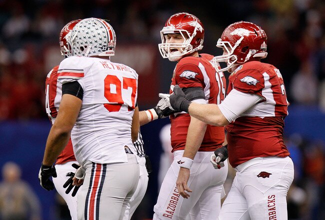 NEW ORLEANS, LA - JANUARY 04:  Ryan Mallett #15 of the Arkansas Razorbacks exchanges words with Cameron Heyward #97 of the Ohio State Buckeyes in the second quarter during the Allstate Sugar Bowl at the Louisiana Superdome on January 4, 2011 in New Orleans, Louisiana.  (Photo by Kevin C. Cox/Getty Images)