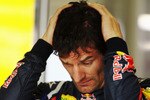 SHANGHAI, CHINA - APRIL 16:  Mark Webber of Australia and Red Bull Racing reacts in his team garage before qualifying for the Chinese Formula One Grand Prix at the Shanghai International Circuit on April 16, 2011 in Shanghai, China.  (Photo by Paul Gilham/Getty Images)