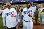 LOS ANGELES, CA - APRIL 15:  Matt Kemp #27 of the Los Angeles Dodgers (R, wearing #42) laughs with Don Newcombe, former Brooklyn Dodgers teammate of Jackie Robinson, before the game with the St. Louis Cardinals as Major League Baseball celebrates Jackie Robinson Day on April 15, 2011 at Dodger Stadium in Los Angeles, California.  (Photo by Stephen Dunn/Getty Images)