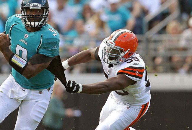 JACKSONVILLE, FL - NOVEMBER 21:  David Garrard #9  of the Jacksonville Jaguars is chased down by Marcus Bernard #58 during a game agaisnt the Cleveland Browns at EverBank Field on November 21, 2010 in Jacksonville, Florida.  (Photo by Mike Ehrmann/Getty Images)