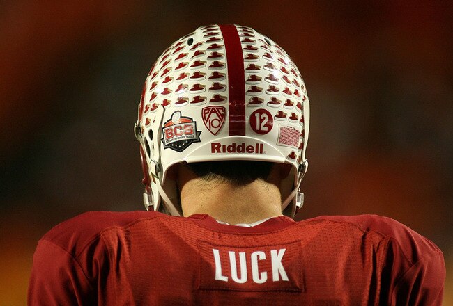 MIAMI, FL - JANUARY 03: Andrew Luck #12 of the Stanford Cardinal stands on the field during warm ups against the Virginia Tech Hokies during the 2011 Discover Orange Bowl at Sun Life Stadium on January 3, 2011 in Miami, Florida. (Photo by Marc Serota/Getty Images)