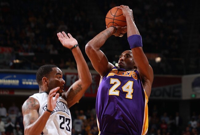 SACRAMENTO, CA - APRIL 13:  Kobe Bryant #24 of the Los Angeles Lakers shoots against Marcus Thornton #23 of the Sacramento Kings look on against  on April 13, 2011 at Power Balence Pavilion in Sacramento, California. NOTE TO USER: User expressly acknowledges and agrees that, by downloading and/or using this Photograph, user is consenting to the terms and conditions of the Getty Images License Agreement  (Photo by Jed Jacobsohn/Getty Images)