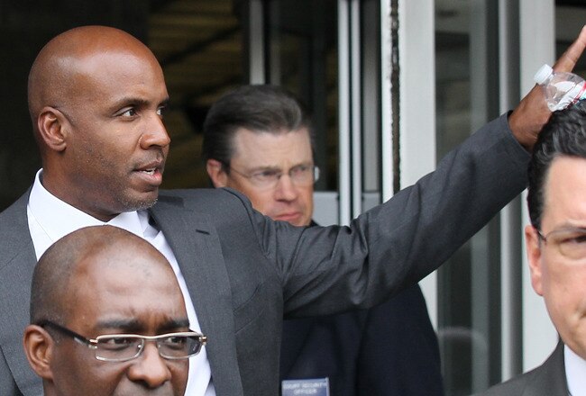 SAN FRANCISCO, CA - APRIL 05:  Former Major League Baseball player Barry Bonds waves as he leaves federal court at the end of the day on April 5, 2011 in San Francisco, California. The prosecution rested their case in the Bonds' perjury trial on accusations of lying to a grand jury about his use of performance enhancing drugs when he played for the San Francisco Giants.  (Photo by Justin Sullivan/Getty Images)