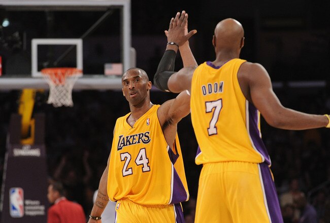 LOS ANGELES, CA - MARCH 31:  Kobe Bryant #24 of the Los Angeles Lakers celebrates with Lamar Odom #7 during a 110-82 win over the Dallas Mavericks at Staples Center on March 31, 2011 in Los Angeles, California.  NOTE TO USER: User expressly acknowledges and agrees that, by downloading and or using this photograph, User is consenting to the terms and conditions of the Getty Images License Agreement.  (Photo by Harry How/Getty Images)