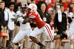 LINCOLN, NE - OCTOBER 30: Cornerback Prince Amukamara #21 of the Nebraska Cornhuskers breaks up a pass intended wide receiver Wes Kemp #8 of the during second half action of their game at Memorial Stadium on October 30, 2010 in Lincoln, Nebraska. Nebraska Defeated Missouri 31-17. (Photo by Eric Francis/Getty Images)